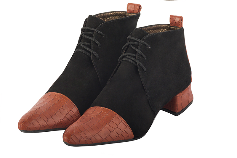 Women's terracotta orange and matt black elegant ankle boots, with laces at the front. Tapered toe. Low flare heels - Front view
